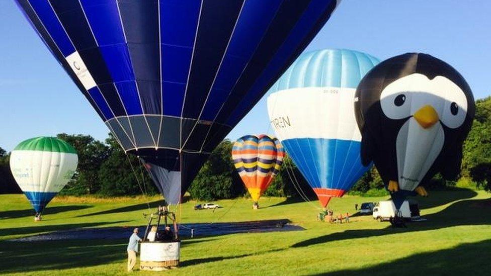 Balloons landing at Ashton Court