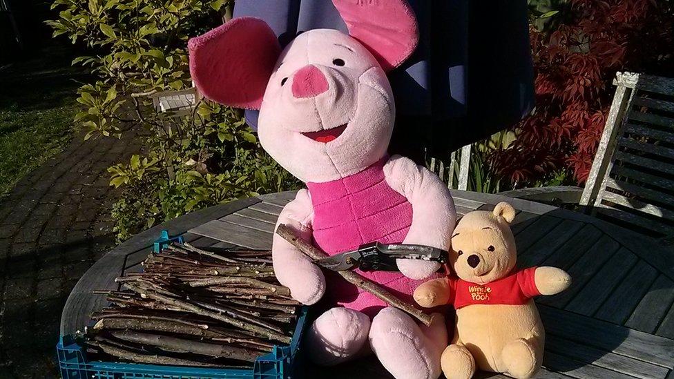 Piglet and Pooh toys with sticks