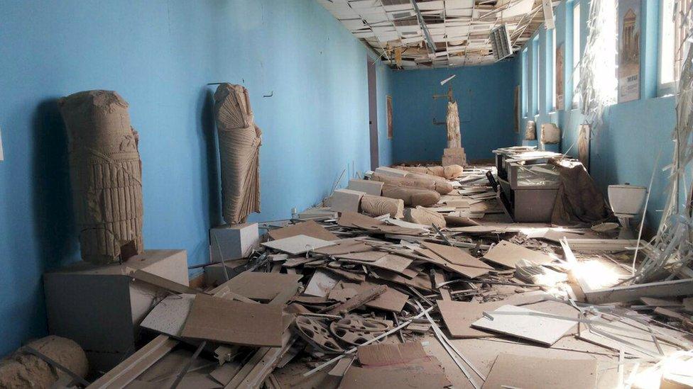 A view shows damaged artefacts inside the museum of the historic city of Palmyra, after forces loyal to Syria"s President Bashar al-Assad recaptured the city, in Homs Governorate in this handout picture provided by SANA on March 27, 2016