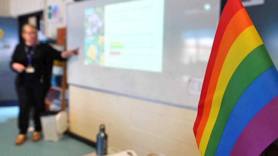 Rainbow flag on teacher's desk