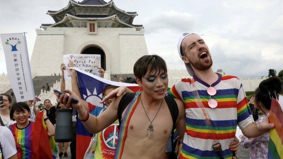 Members of the LGBT community join a march to celebrate the pride month at the National Chiang Kai-shek Memorial Hall in Taipei, Taiwan, 28 June 2020