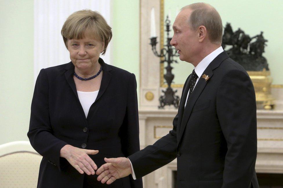 Angela Merkel and Vladimir Putin