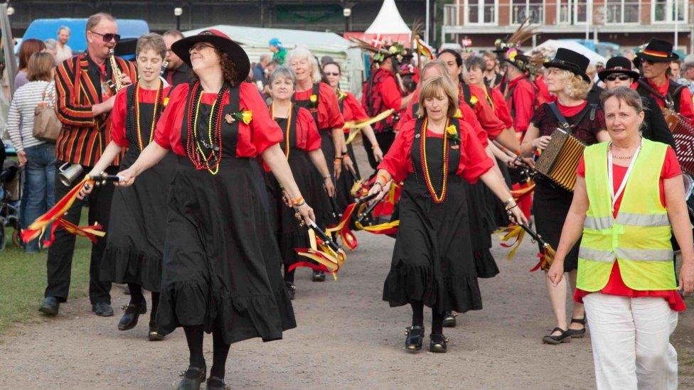 Morris dancers parading through Shrewsbury