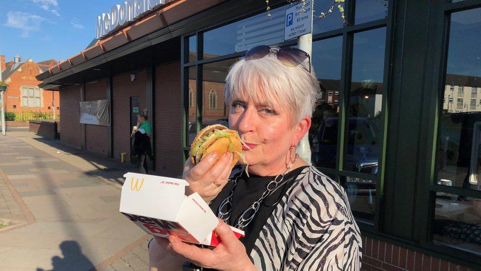 Caroline Aston eating a Big Mac