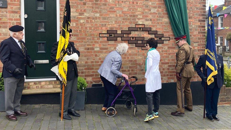 Joan Stanley, 93, unveils the memorial