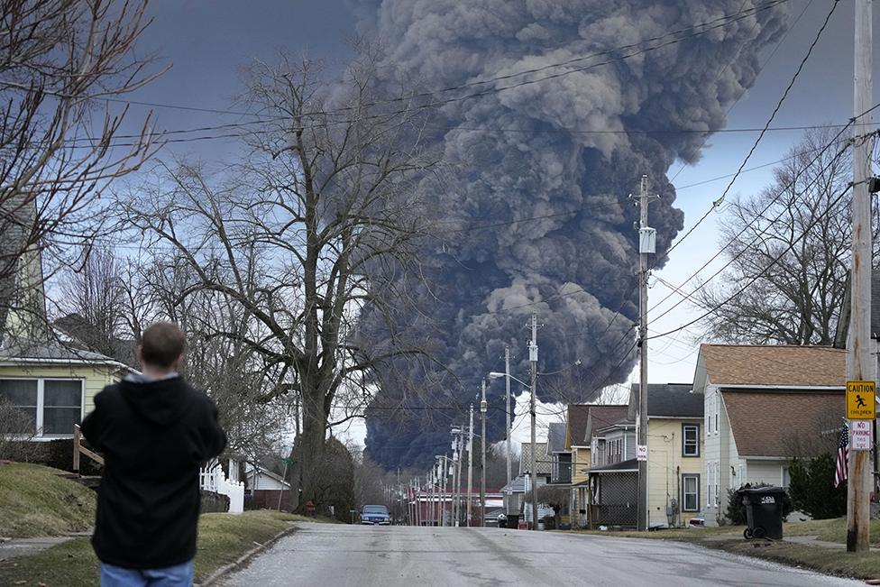 A smoke cloud rises above East Palestine after the train derailment