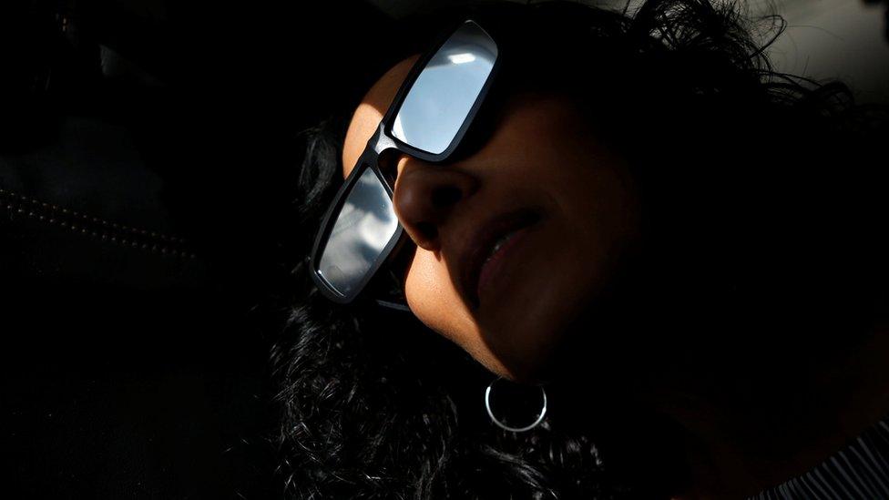 Passengers view the solar eclipse from an Alaska Airlines commercial jet over the Pacific Ocean off the coast of Depoe Bay, Oregon, US, 21 August 2017