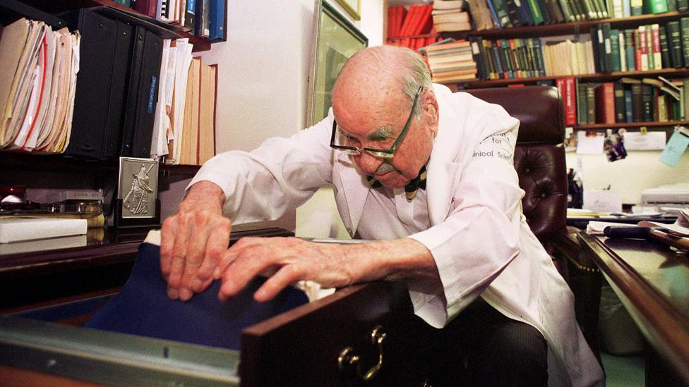 Dr. F. William Sunderman looks through some of the files in his office at the Pennsylvania Hospital in Philadelphia on June 11, 1999. Sunderman is a 100-year-old pathologist who was honored as America's official oldest living worker. Sunderman works at the Institute for Clinical Science at the Pennsylvania Hospital.