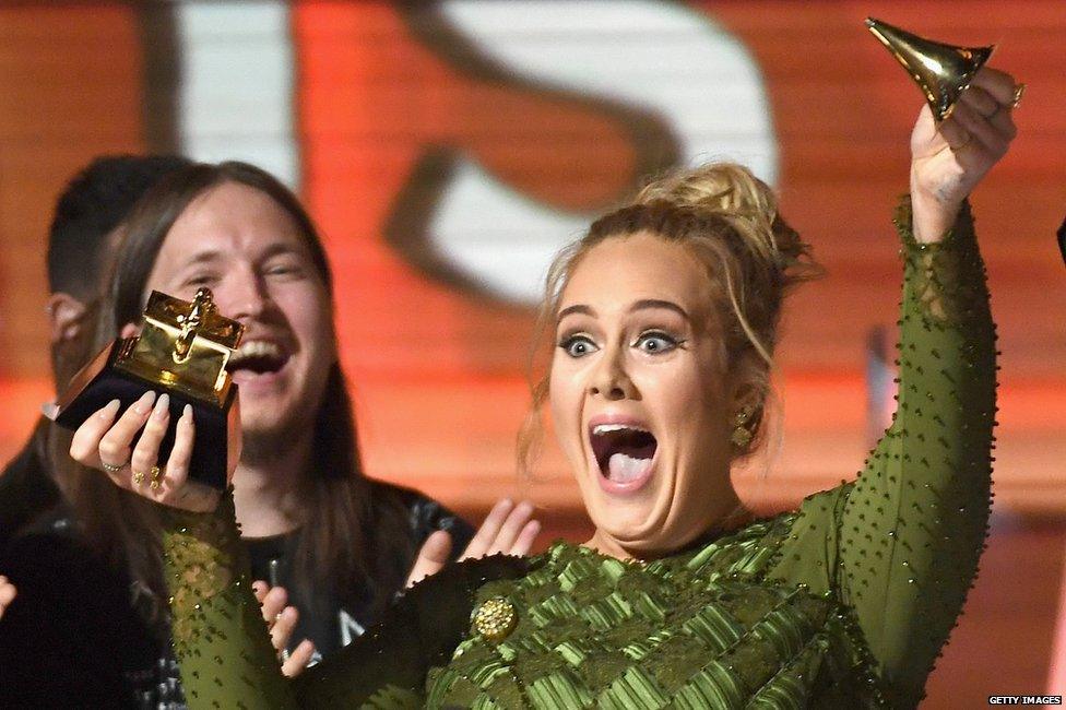 Adele breaking an award