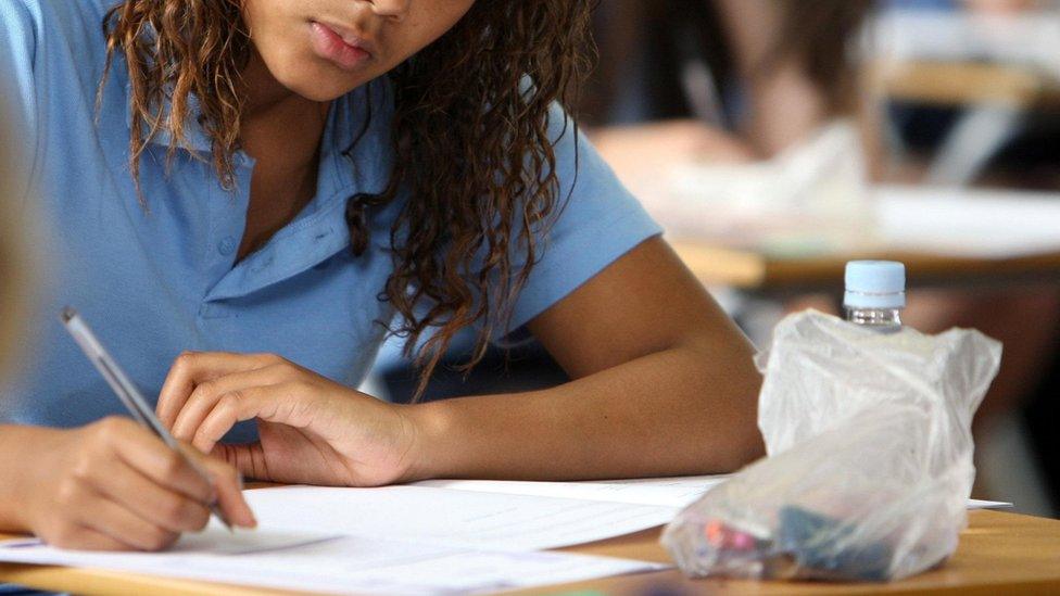 Girl taking school exam