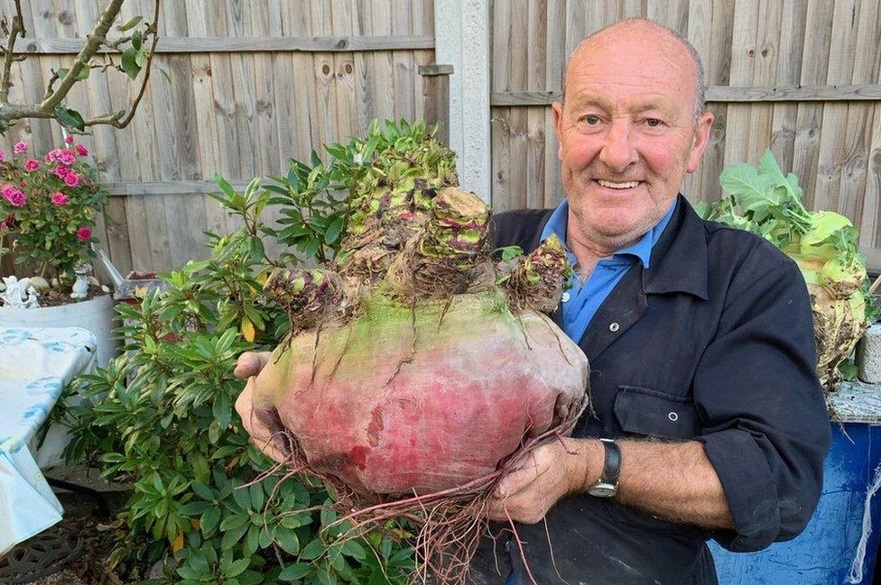 Joe Atherton with his giant vegetables