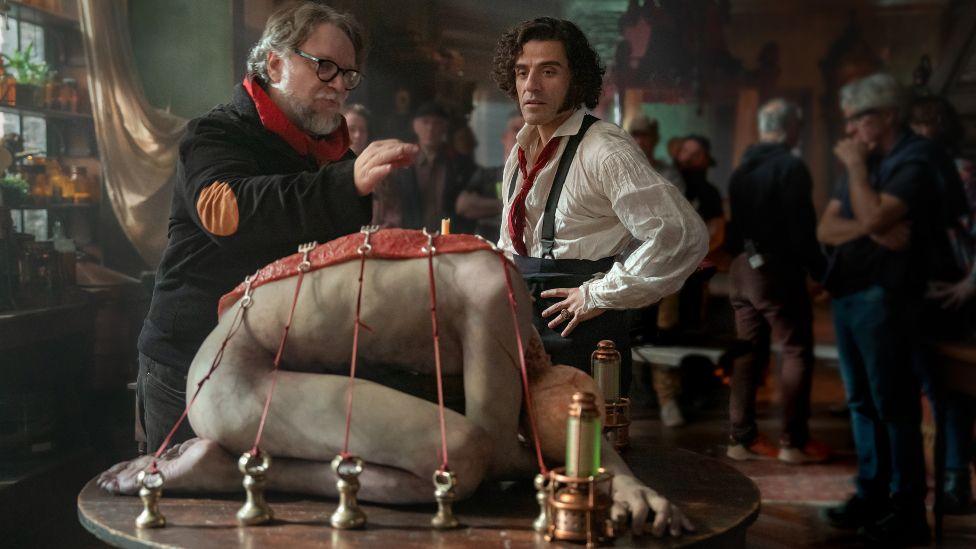 Director Guillermo del Toro and Oscar Issac as Victor Frankenstein on the set of Frankenstein