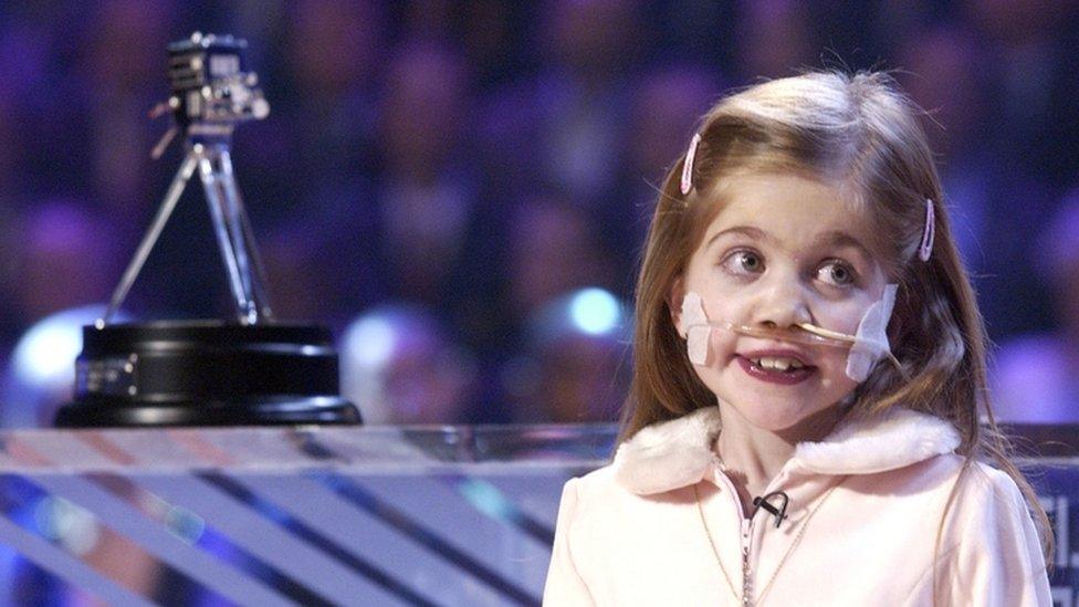 Kirsty Howard is presented with the Helen Rollason award