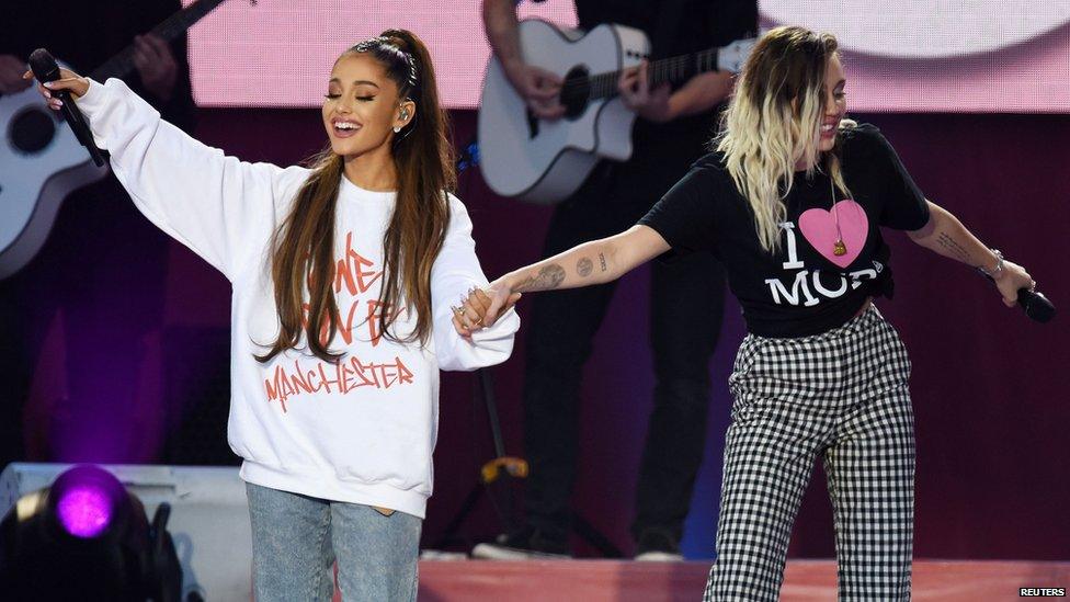 Ariana Grande on stage with Miley Cyrus