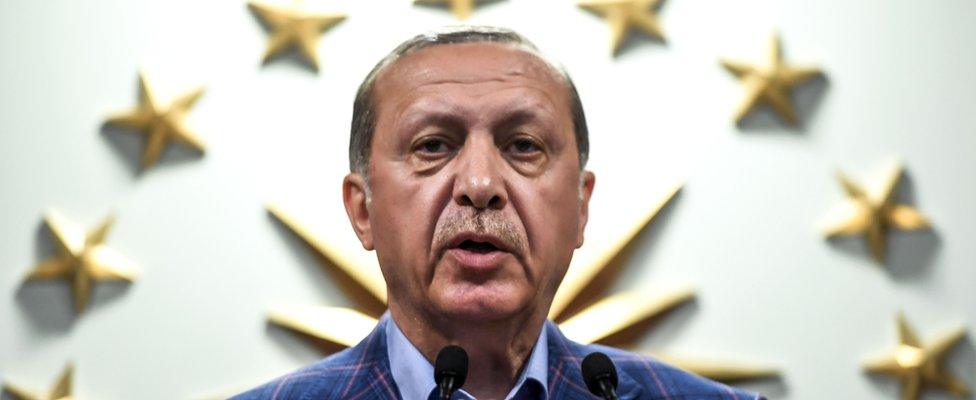 Turkish president Recep Tayyip Erdogan delivers a speech at the conservative Justice and Development Party (AKP) headquarters in Istanbul, on April 16, 2017, after the results of a nationwide referendum that will determine Turkey's future destiny.