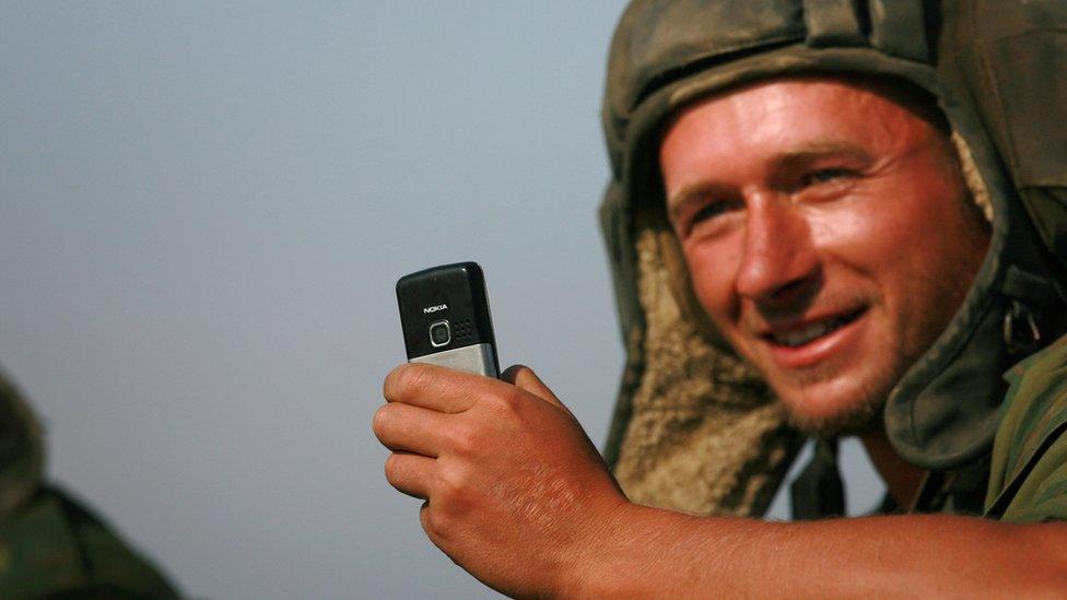 Russian soldier taking photo of himself in Georgia, 22 Aug 08