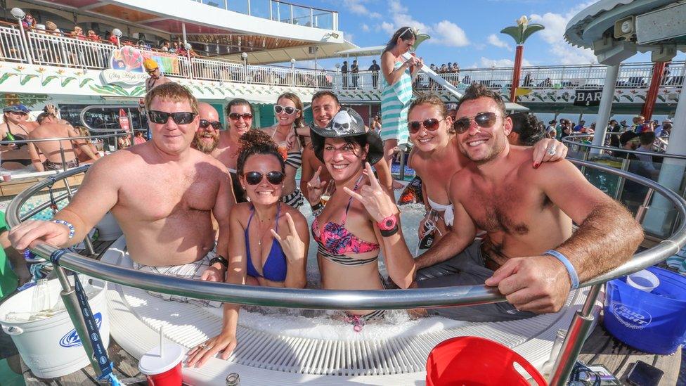 People in a hot tub on a music cruise