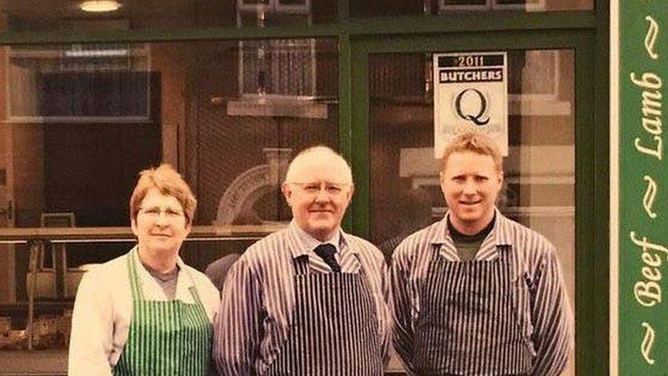 Julie, Arthur and Chris Wright outside their shop