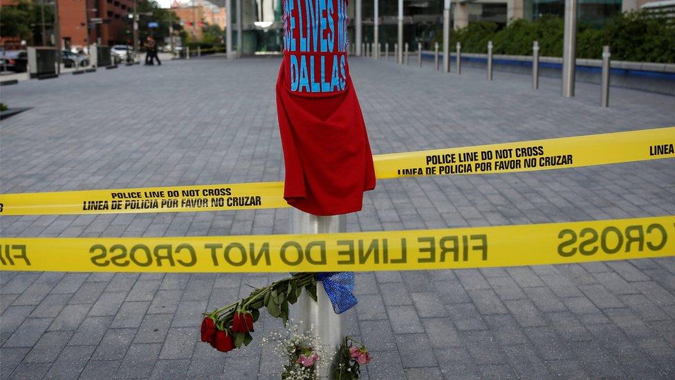 Makeshift memorial is seen near the crime scene two days after a lone gunman ambushed and killed five police officers at a protest decrying police shootings of black men, in Dallas, Texas on 9 July