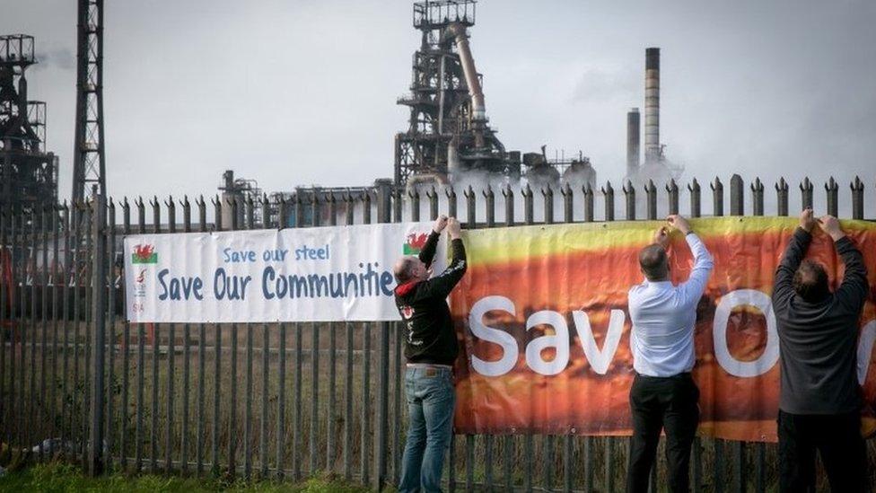 A union banner was placed outside the Port Talbot plant after the announcement of job cuts