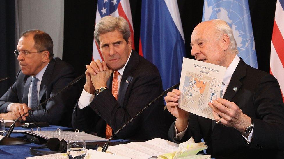 US Russian Foreign Minister Sergey Lavrov (L) and Secretary of State John Kerry (C) listen to UN special envoy on Syria Staffan de Mistura at a meeting of the International Syrian Support Group (ISSG)
