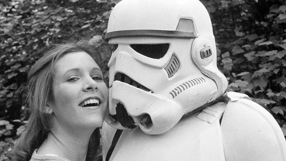 Carrie Fisher with stormtrooper