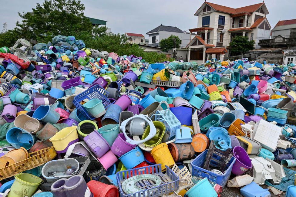 Piles of plastic waste are pictured at a recycling site next to a residential area on the outskirts in Hanoi, Vietnam on September 17, 2024. 