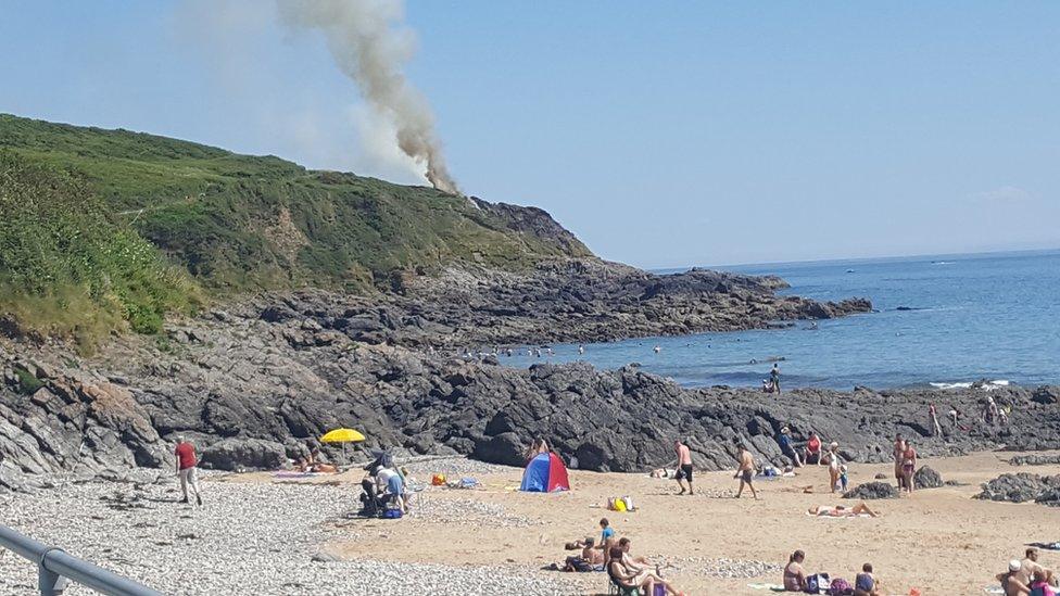 The grass fire can be seen from beaches in the Mumbles