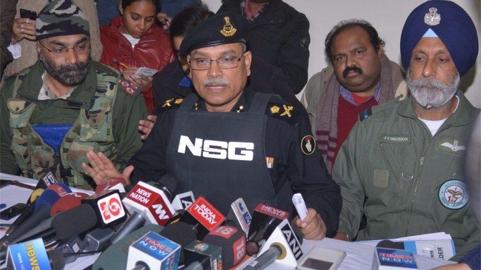 National Security Guard (NSG)"s IG (Operations), Major General Dushyant Singh, (C), Air Officer Commanding (AOC) Air Force Station Pathankot, Air Commodore J S Dhamoon (R) and Army Brigadier Anupinder Singh Bevli (L) speak to the media at the airforce base in Pathankot on January 4, 2016