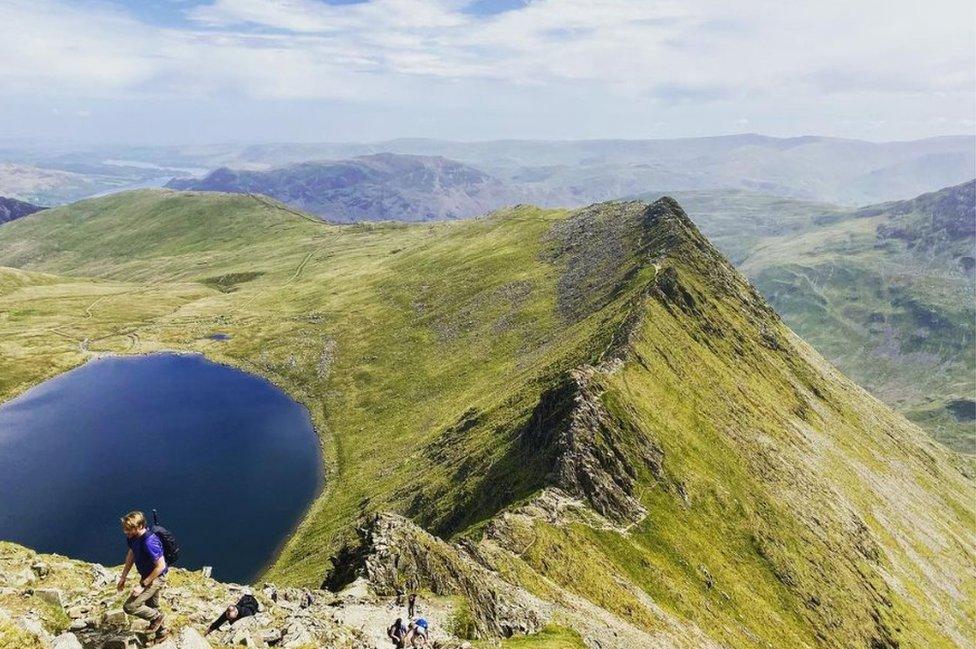 People walk on Striding Edge