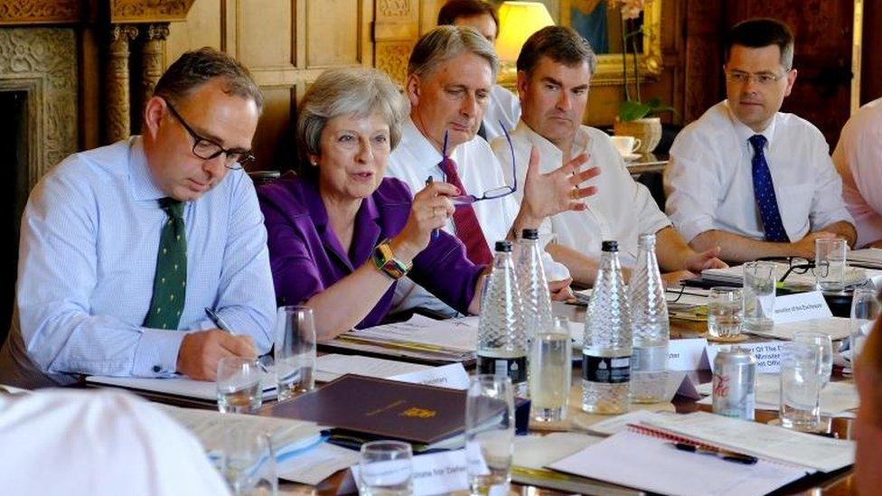 Prime Minister Theresa May speaks during the Cabinet ministers' meeting at Chequers,