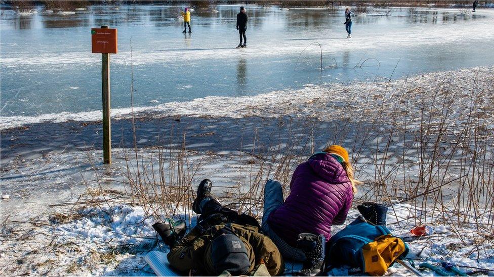 As the wintry weather continues, skaters are taking the chance to skate in one of the frozen lakes close to the Dutch city of Nijmegen, on February 12th, 2021.