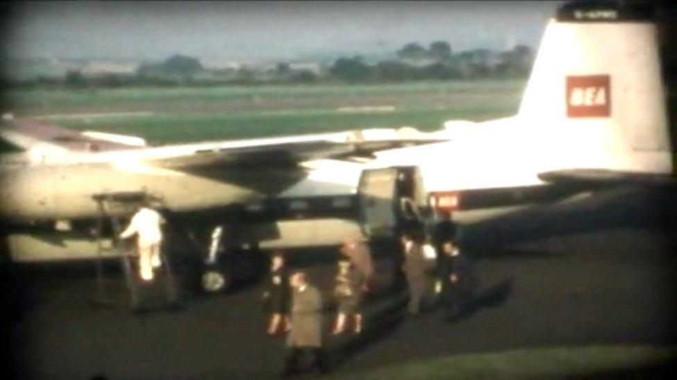 Passengers disembark a plane at Edinburgh Airport in 1965