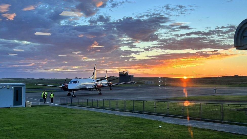 A plane collecting Dr Payne from Kirkwall airport in Orkney