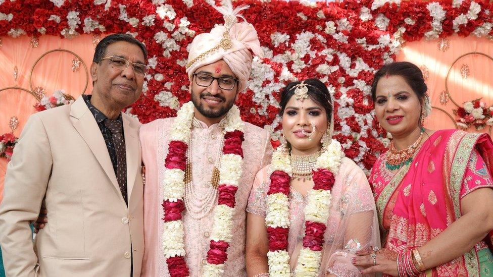 Priya and Arav with her parents