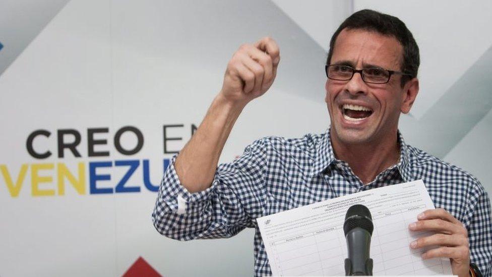 Venezuelan opposition leader Henrique Capriles Radonski speaks during a press conference in Caracas, Venezuela, 26 April 2016. The National Election Commission (CNE) agreed to begin the process of possibly rescinding the mandate of Venezuelan President Nicolas Maduro, after agreeing to deliver the form requested by the opposition to gather the nearly 4 million signatures needed to initiate a referendum