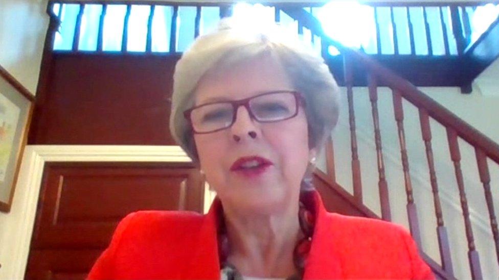 Theresa May speaking via video link