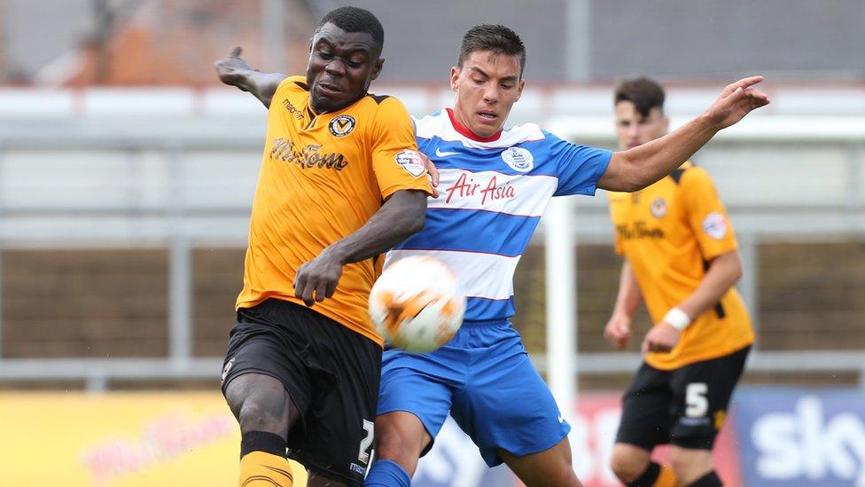 Nana Twumsai of Newport County and Reece Grego-Cox of Queens Park Rangers compete