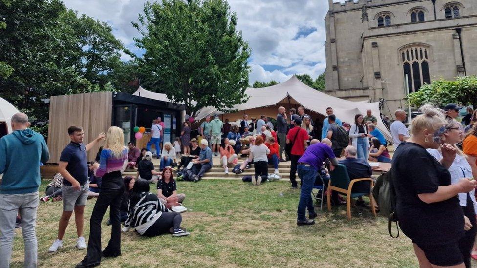 A group of people gathered outside for the festival