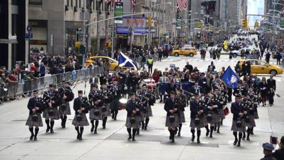 Pipe band marches in Tartan Day parade