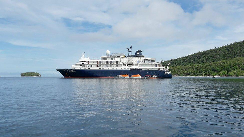 This photo taken on 4 March 2017 shows the Caledonian Sky in Raja Ampat, eastern Indonesia.