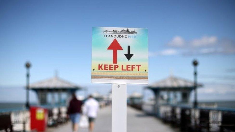 Social distancing in operation on Llandudno pier on Saturday