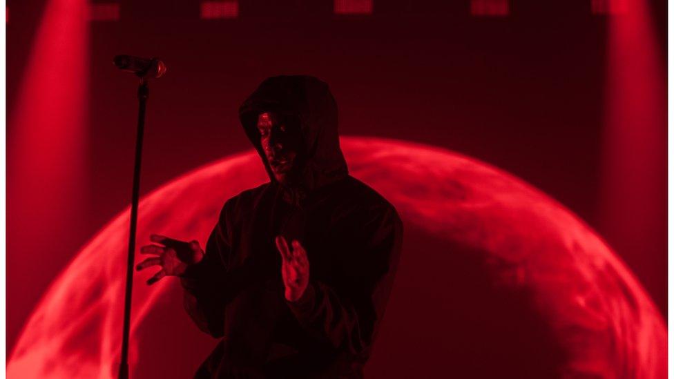 This is a photo of Skepta performing at his London show in Alexandra Palace.