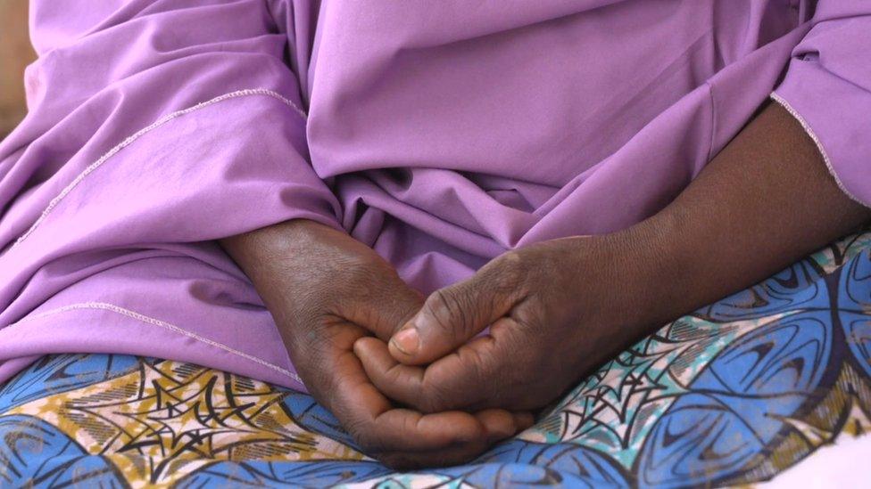 Woman's clasped hands