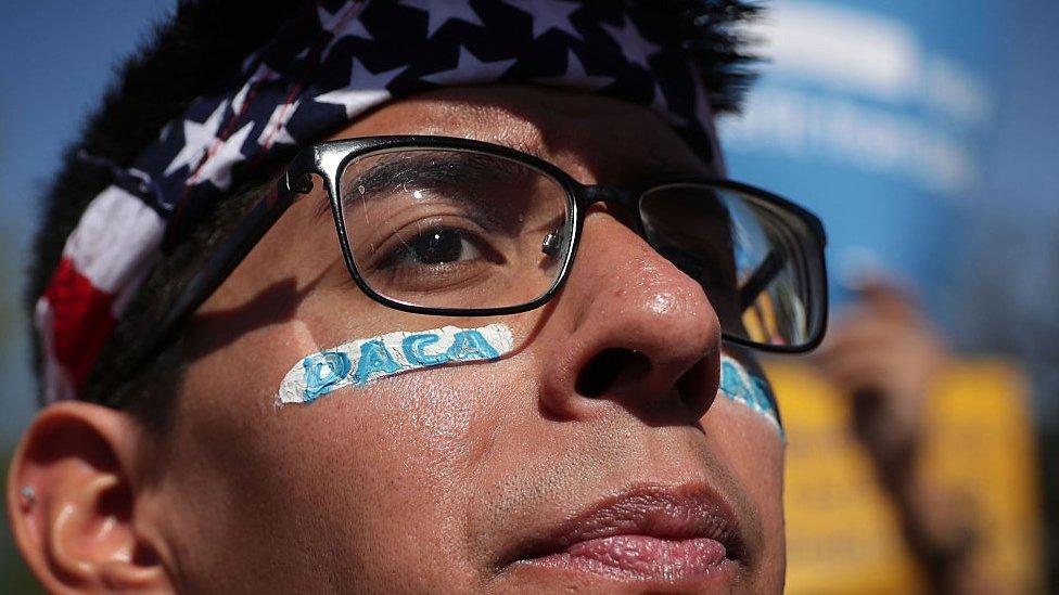 ro-immigration activist Omar Martinez attends a rally in front of the U.S. Supreme Court April 18, 2016 in Washington, DC