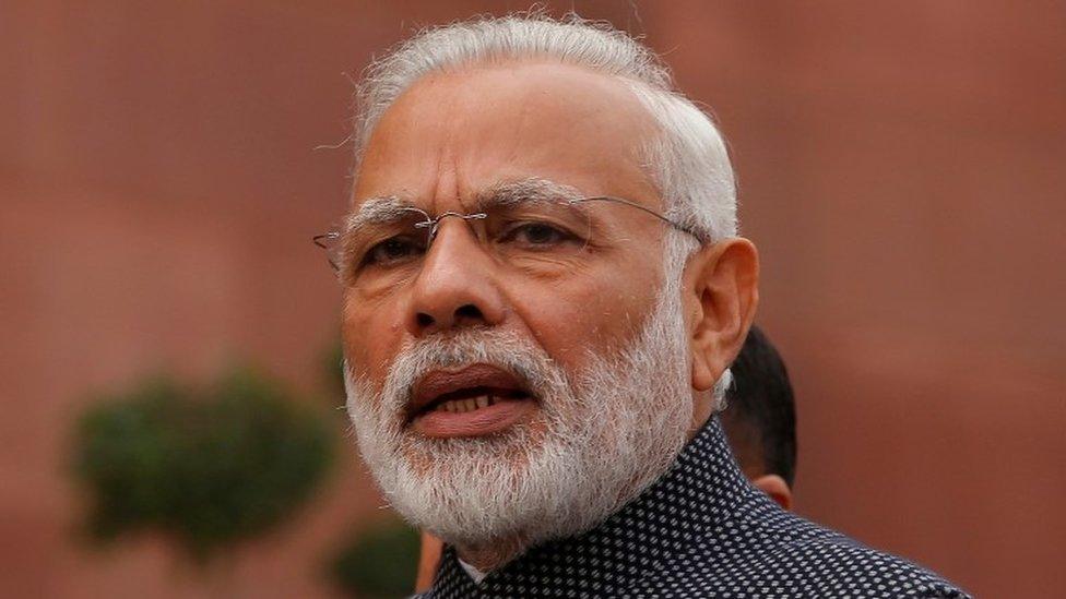 India's Prime Minister Narendra Modi speaks to the media inside the parliament premises on the first day of the winter session in New Delhi, India, November 16, 201