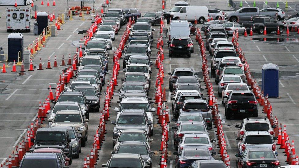 Long line of cars at a testing site in Miami