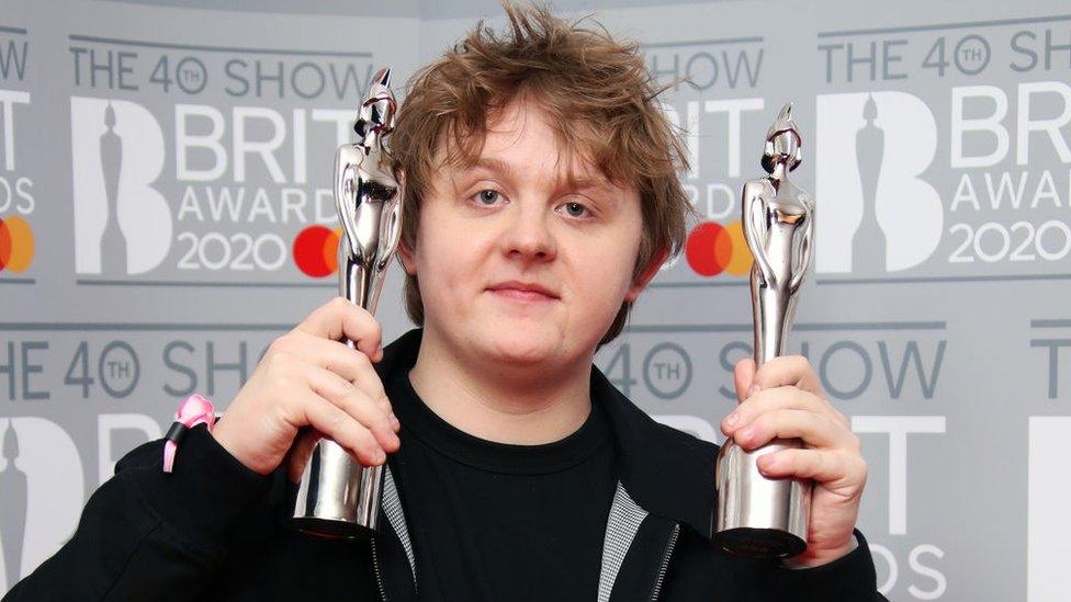 Lewis-Capaldi-poses-with-Brit-Awards.