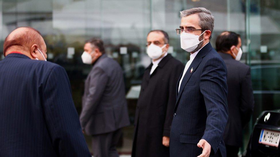 Iran's chief nuclear negotiator, Ali Bagheri Kani (R), arrives at talks with world powers in Vienna, Austria (29 November 2021)