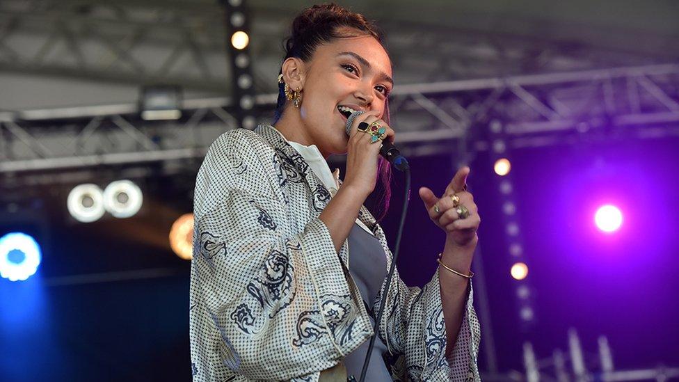 Joy Crookes performing